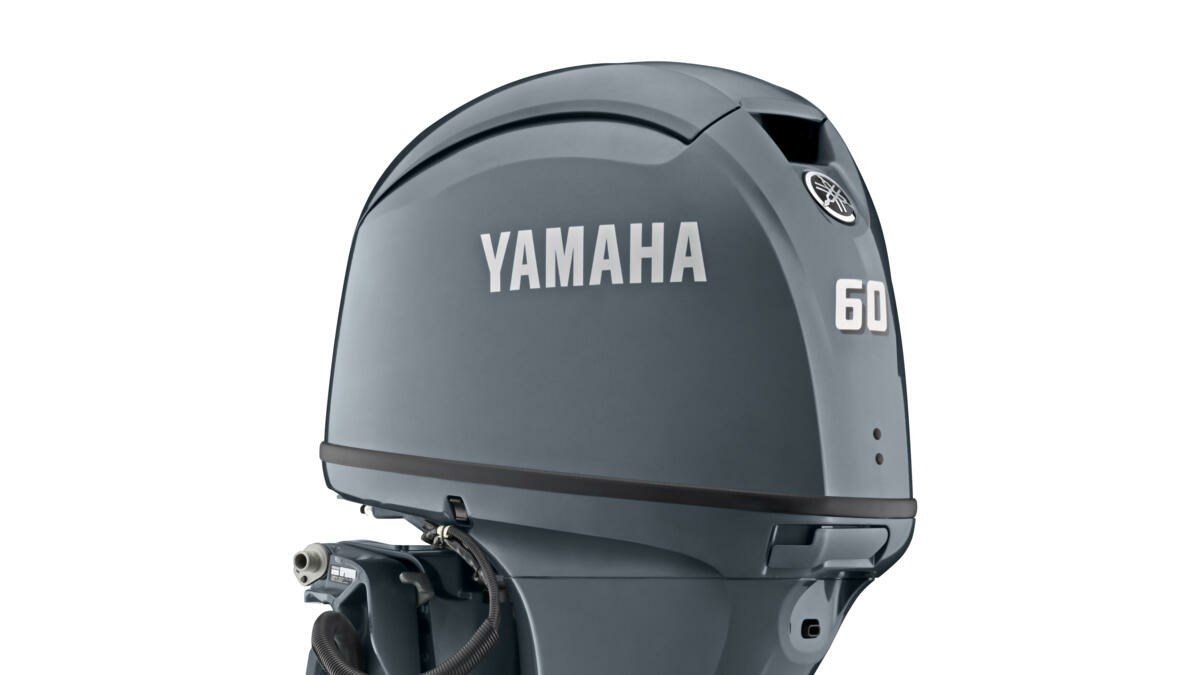 Compact shape and solid one- piece top cowling